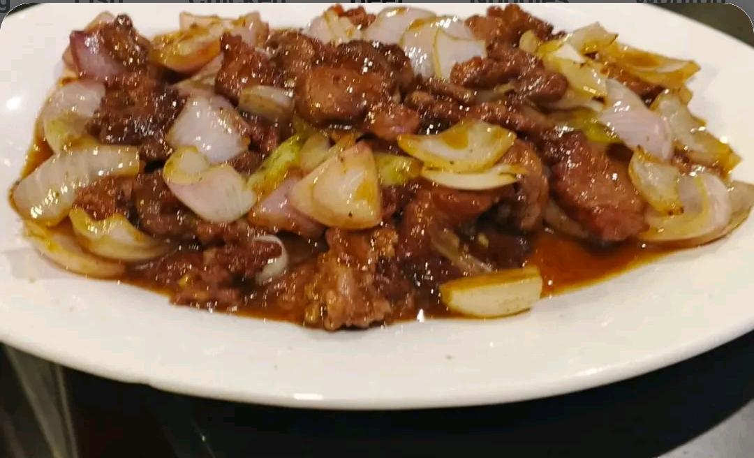 68 Fried Beef with Onions
